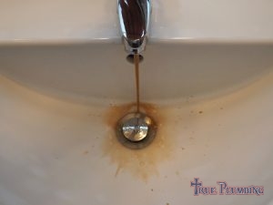 A Faucet Runs Dirty Water.